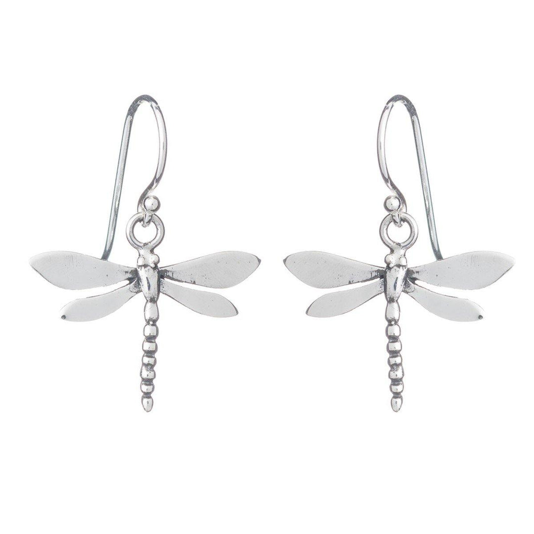 A pair of Wildlife Dragonfly Dangle Earrings by Gallardo & Blaine Designs with detailed wings and segmented bodies. The earrings hang from simple silver hooks. The design is symmetrical, with the dragonflies' wings gently curved and bodies extended downward—exquisite sterling silver dangle earrings for any occasion.