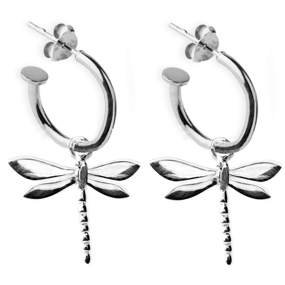 A pair of Wildlife Dragonfly Huggies by Gallardo & Blaine Designs. The dragonflies feature intricately detailed wings and a segmented body, hanging from the bottom center of each hoop. These elegant earrings have stud backs for secure fastening.