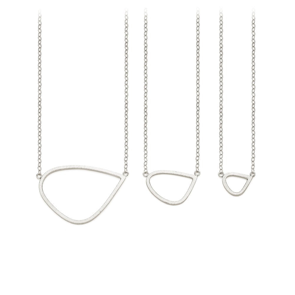 Four Leoma Drew Frosted Silver Single Wing Pendants, each hanging from delicate chains, are displayed in descending order of size against a white background.