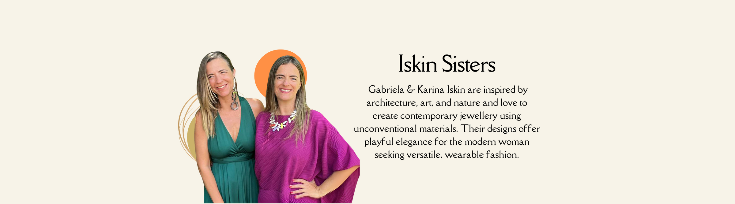 Two women smiling, one in a green dress and the other in a magenta dress, stand beside a text description of "Iskin Sisters," Gabriela and Karina Iskin, who design contemporary jewelry inspired by architecture, art, and nature.