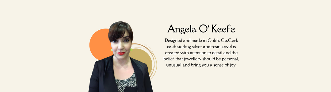Image of Angela O'Keefe with text describing her jewelry, which is designed and made in Cobh, Co. Cork. The text emphasizes attention to detail and the belief that jewelry should be personal, unusual, and bring a sense of joy.