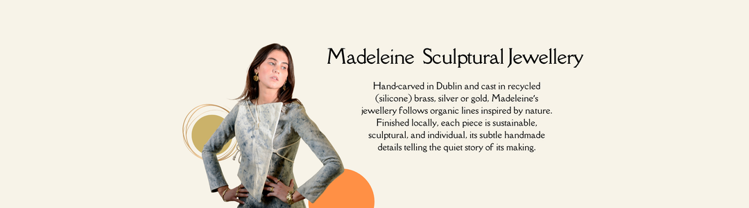 A banner for Madeleine Sculptural Jewellery with abstract jewelry pieces and text about handcrafted, eco-friendly jewelry made in Dublin using recycled materials and organic designs.