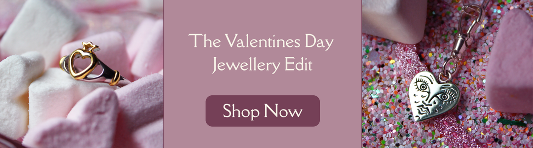 Gold heart-shaped key ring and silver face-engraved heart pendant on marshmallows and sprinkles, with “The Valentines Day Jewellery Edit. Shop Now” in white text on a mauve background.