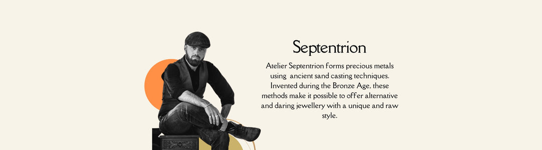 A man wearing a cap and dark clothing sits on a wooden chest, looking at the camera. The text next to him reads "Septentrion" and describes the artisan techniques used by Atelier Septentrion to create alternative and daring jewelry.