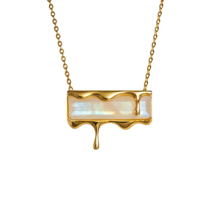 The Dripping Pendant Necklace Gold from Marie June Jewellery showcases a pendant with a rectangular opal stone, artfully designed to give the appearance of melting. Crafted from luxurious 18K yellow gold, the gold delicately drips over the stone, creating an artistic and fluid effect. The chain features small, interconnected gold links for a refined finish.