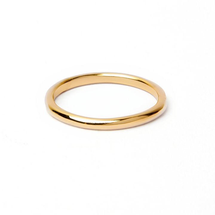The Collective Dublin's 2mm Classic Round Wedding Band is a sleek, polished gold ring displayed on a white background—ideal for those who prefer an understated, elegant wedding ring.