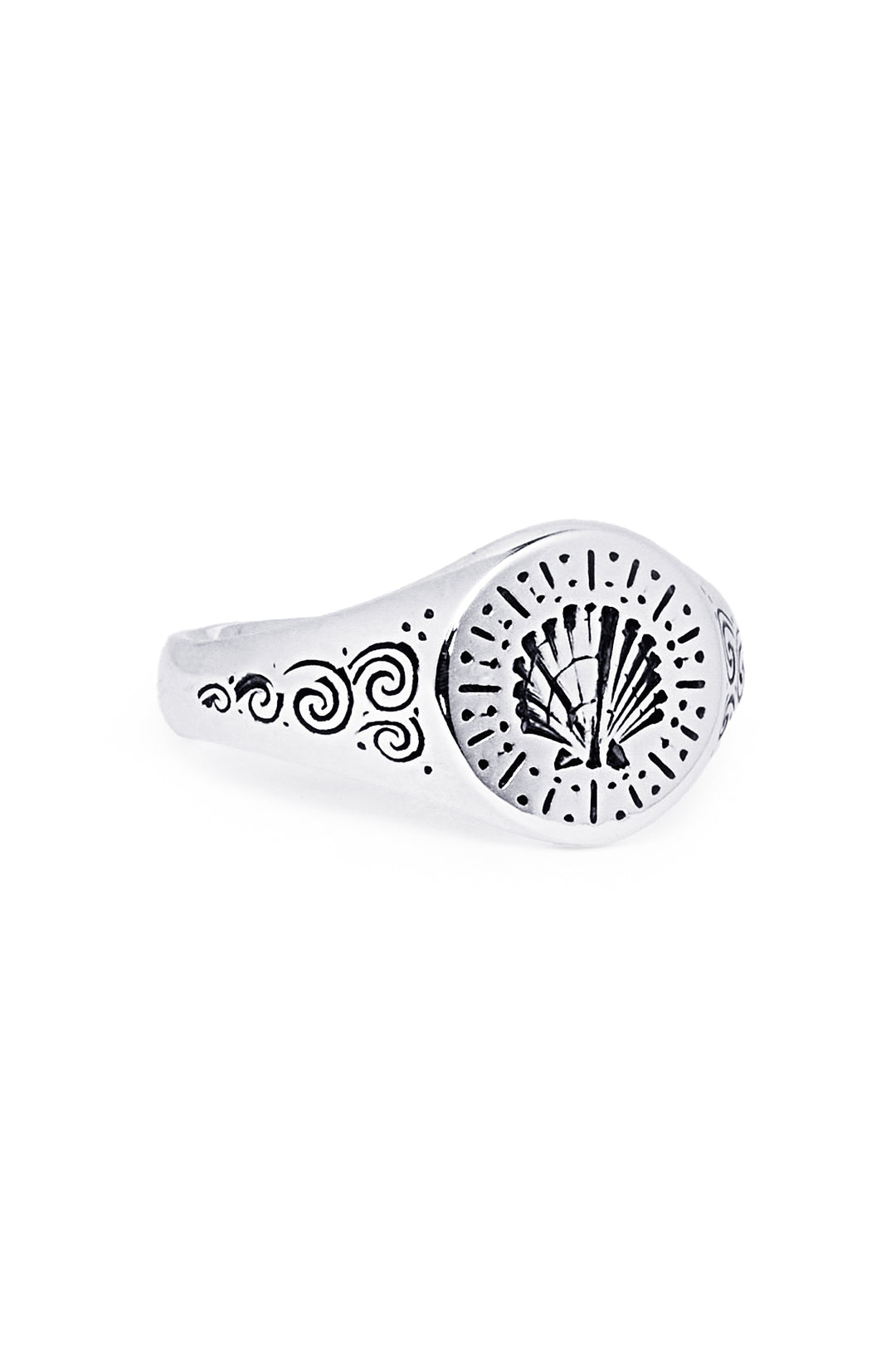 The Silver Sea Shell Signet by Cosmic Boulevard is a handmade engraved ring from Dublin featuring a central shell design with dotted and swirling patterns—ideal for custom engraving.