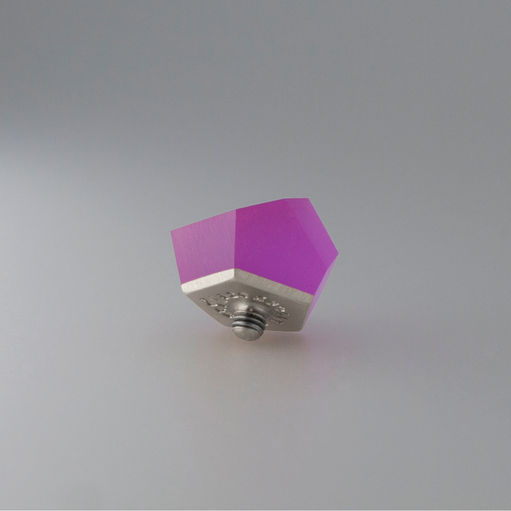 A Fruit Bijoux Fruit Bijoux Ring Top VU Crystals Magenta Pink with a sterling silver base and a vibrant purple ring top is centered on a plain background. The base has a small screw protruding from it. The sleek, geometric design gives it a modern, minimalist appearance.