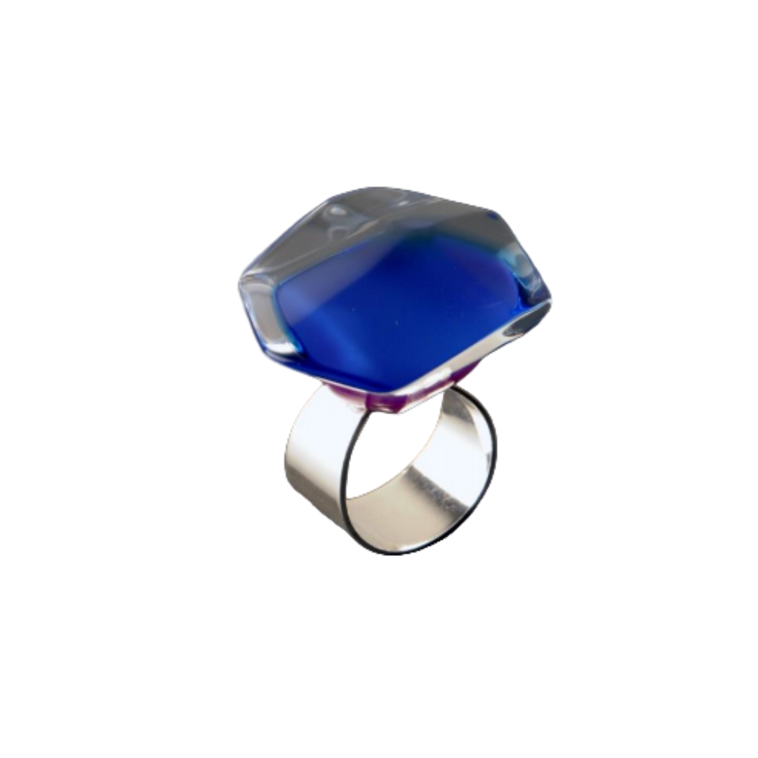Acrylic Dark Blue Ring by MX.design featuring a large hexagonal blue acrylic gemstone and an adjustable sterling silver band. Displayed on a white background.