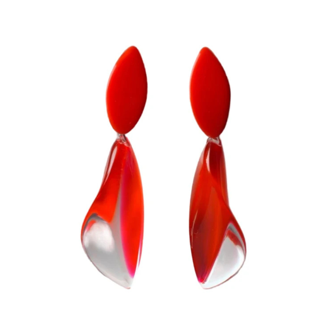 Acrylic Red Twist Earrings by MX.design feature a glossy red oval top and a wavy, translucent red-and-clear lower section, shown on a white background.