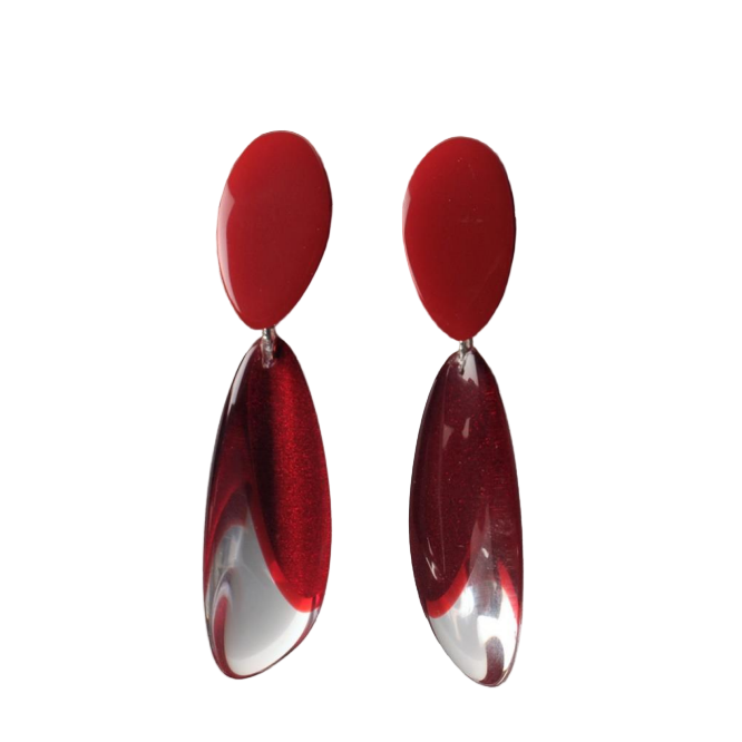 Red and clear acrylic teardrop earrings on a wooden branch
