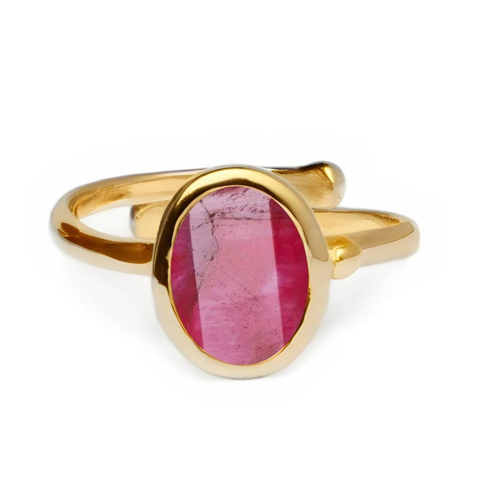 The Gallardo & Blaine Designs Adjustable Dream Ring showcases a minimalist open band design with a central large oval pink gemstone, set elegantly against a plain white background. Its adjustable feature guarantees a perfect fit for any occasion.