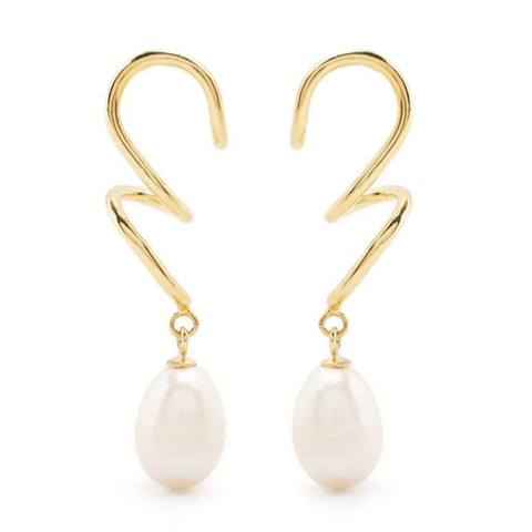 A pair of *Agne Pearl Earrings* by *Bonvo*, each featuring a single pearl drop. The earrings have a modern and elegant design, with the pearls hanging from the lower end of each spiral. The background is plain white.