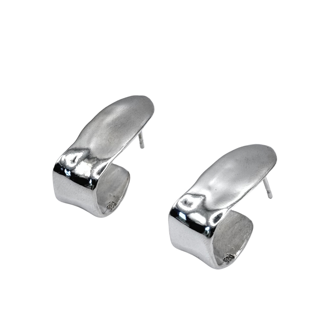 The Alma Square Earrings by Inó Jewellery are sterling silver with a modern, wavy design, shown on a white background—ideal for lovers of handmade Dublin jewelry.