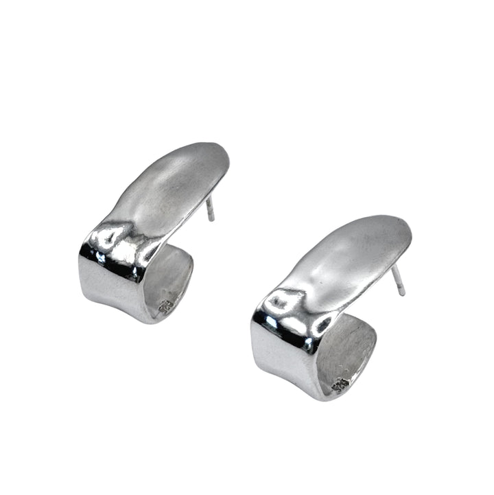 The Alma Square Earrings by Inó Jewellery are sterling silver with a modern, wavy design, shown on a white background—ideal for lovers of handmade Dublin jewelry.