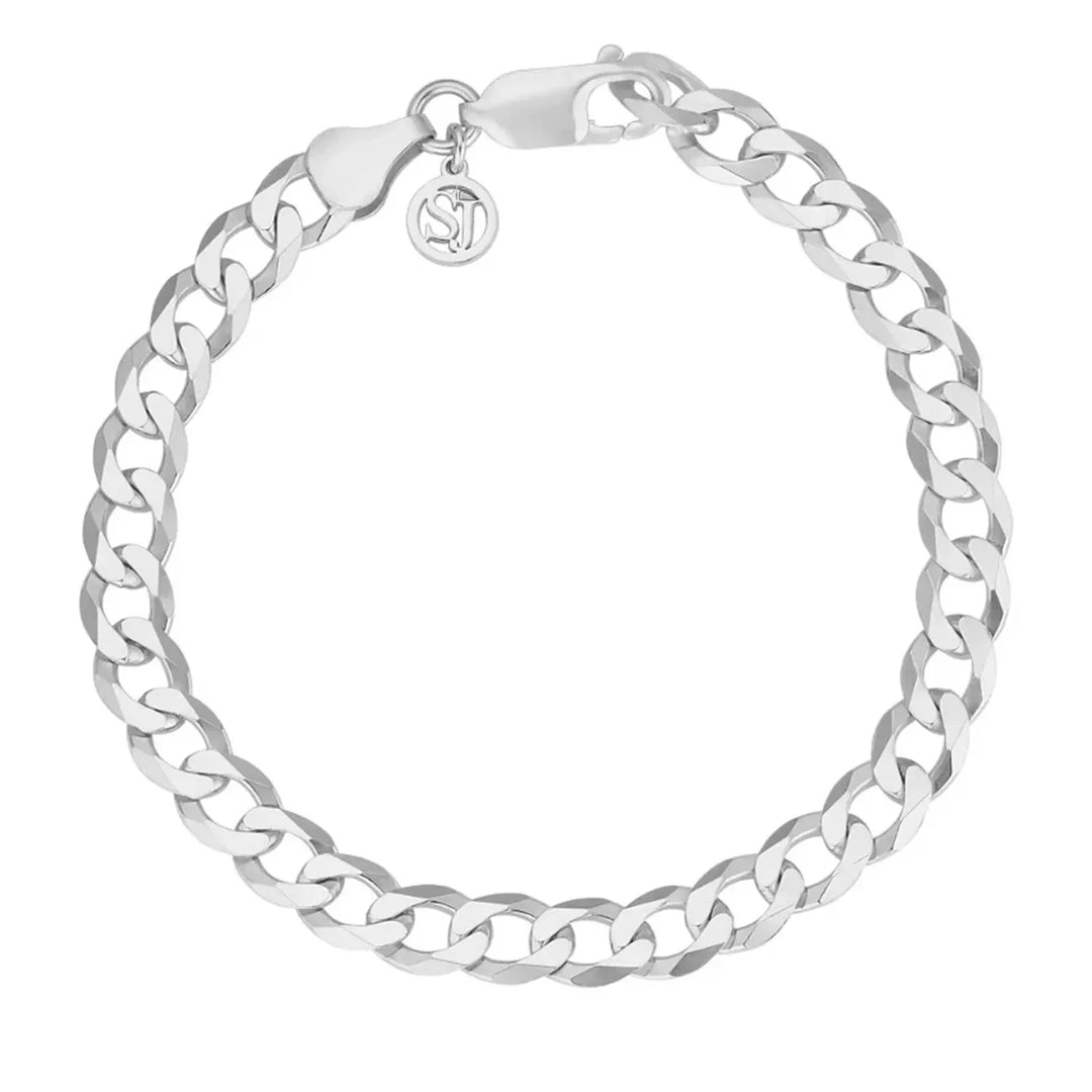 The Sif Jacobs Armore Bracelet is crafted from 925 Sterling silver with flat interlocking curb links, a lobster clasp, and a small round charm engraved with the brand logo for timeless elegance.