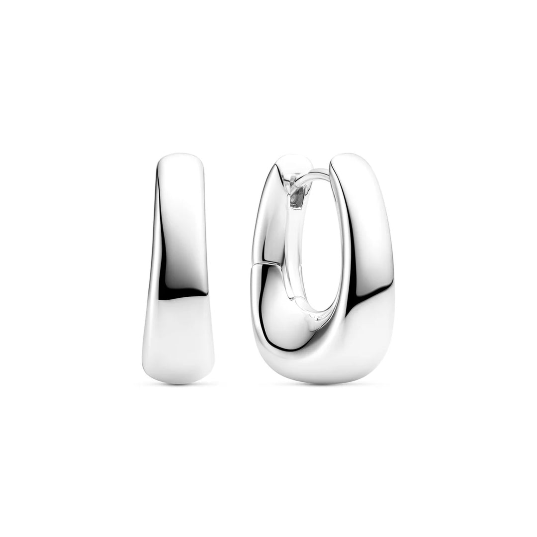 A pair of Borsa Pianura Earrings by Sif Jacobs in shiny, polished rhodium-plated sterling silver. One earring is shown from the front and one from the side, both highlighting their chunky, modern design against a white background.