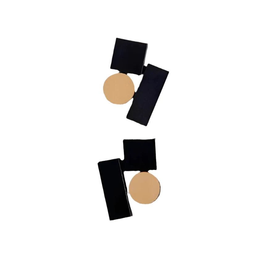 Product Data-Based Sentence: The Iskin Sisters Bauhaus Earrings Small in various colors are displayed against a white background. Showcasing a modern, geometric design with gold circles attached to black rectangles, these earrings exemplify material excellence and Featherlight Design.