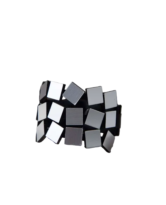 A wide cuff bracelet made of alternating square panels in silver colour on a white background.