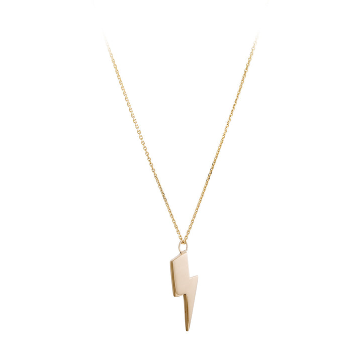 The Bowie Lightning Bolt Pendant 9ct Gold by Cosmic Boulevard showcases a small, stunning lightning bolt charm. This minimalist necklace features a delicate chain that perfectly accentuates the modern design of the central pendant. The plain white background enhances the piece's understated elegance and sophistication.