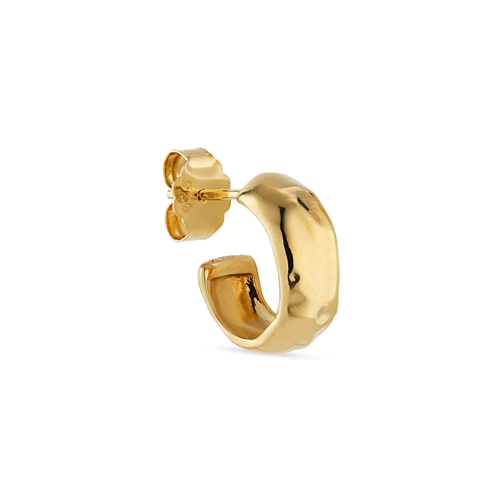The Jane Koenig Bruised Heart Hoop is a small, chunky gold-plated earring featuring a textured finish and butterfly back, shown on a plain white background.