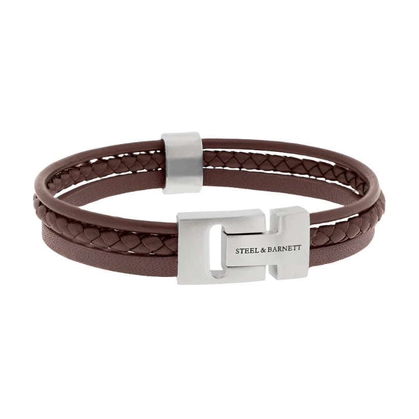The Cole - Brown bracelet by Steel and Barnett boasts brown genuine leather cords in a streamlined design with two bands—one braided and one smooth. They come together with a polished rectangular stainless steel clasp engraved with "Steel & Barnett," offering a contemporary and minimalist aesthetic.