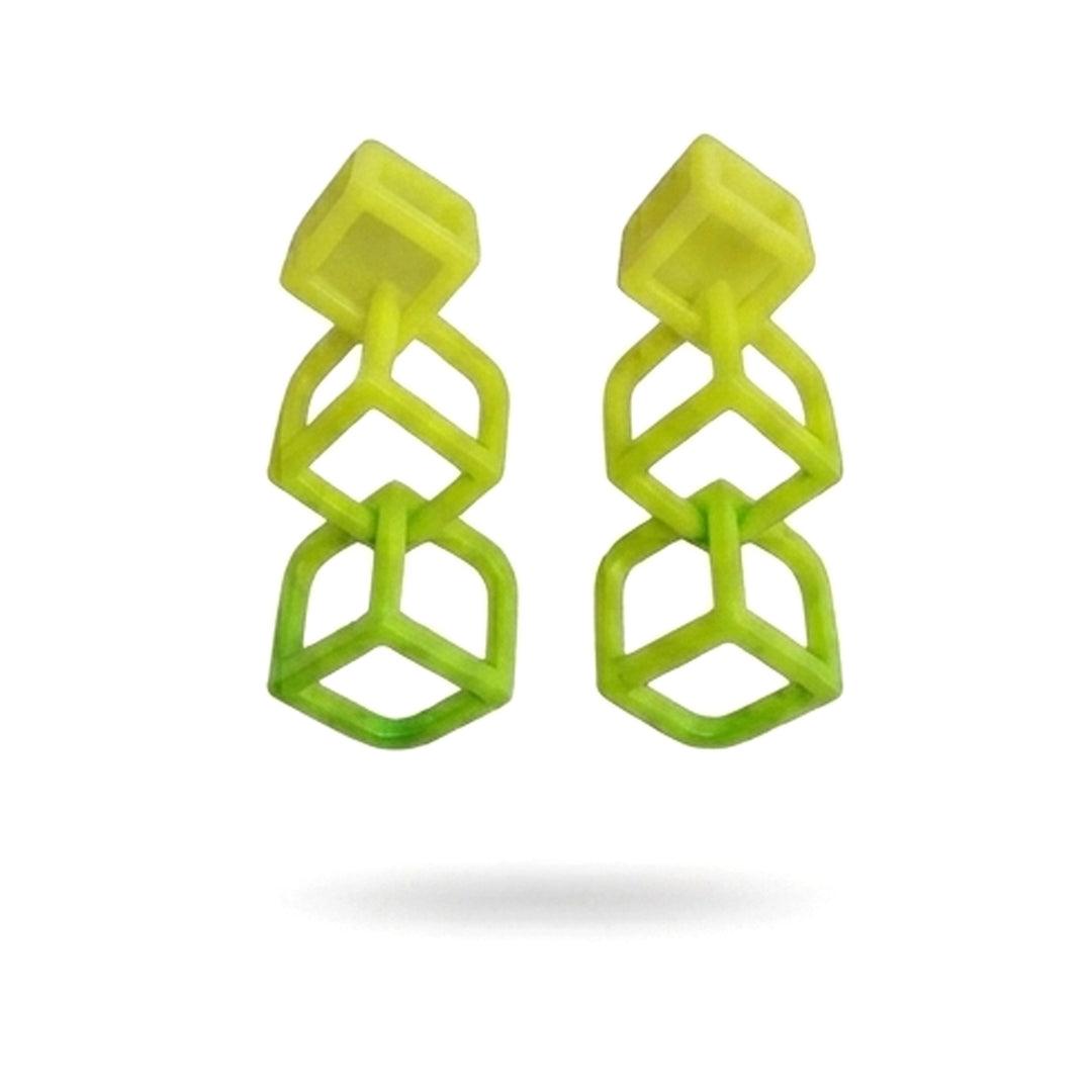 The Cubic Earrings Citrus by Tochu-De feature three vertically connected, bright yellow-green 3D-printed cubes, displayed on a white background with a shadow below.
