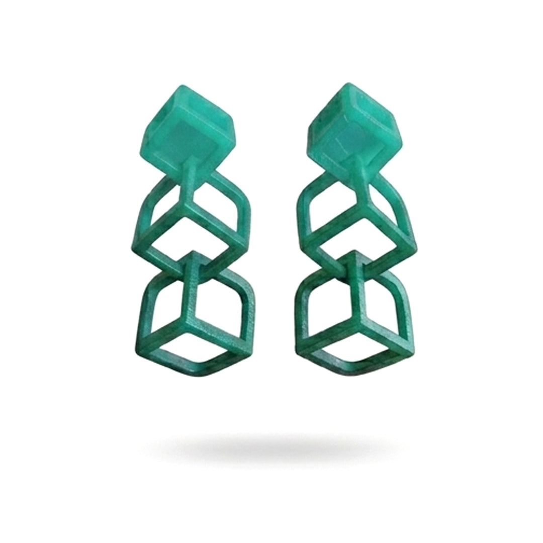 The Tochu-De Cubic Earrings Green feature three stacked, open green translucent cubes in a geometric design, shown on a white background with a faint shadow.