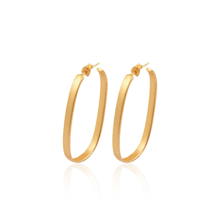 A pair of Clara Gold Drop Hoops by Watermelon tropical with a slim and rectangular shape, featuring a polished finish. The earrings have a minimalist design with a smooth texture, making them look elegant and classic. Displayed on a white background, these Clara Gold Drop Hoops bring timeless sophistication to any style.