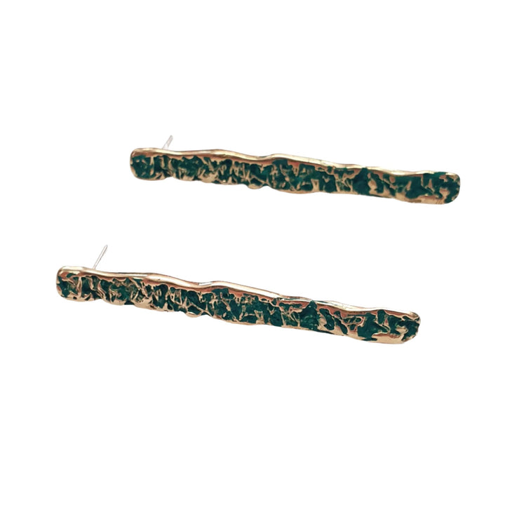 Discover the Crackle Texture Bar Earrings by Georgia Charal, crafted in a rectangular design with an artistic mix of green and gold. These handmade earrings made from gold-plated silver feature a crackle texture finish that enhances their stylish appeal. Designed with posts for pierced ears, they are the perfect combination of elegance and craftsmanship.