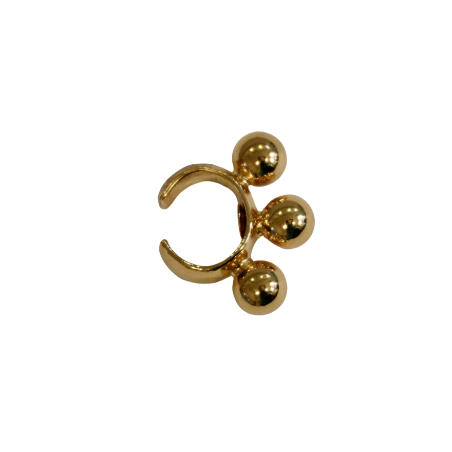The Zubeldia Gold Plated Earcuff with 3 Golden Balls features an open band and polished round beads, inspired by Hélène Zubeldia, shown on a white background.