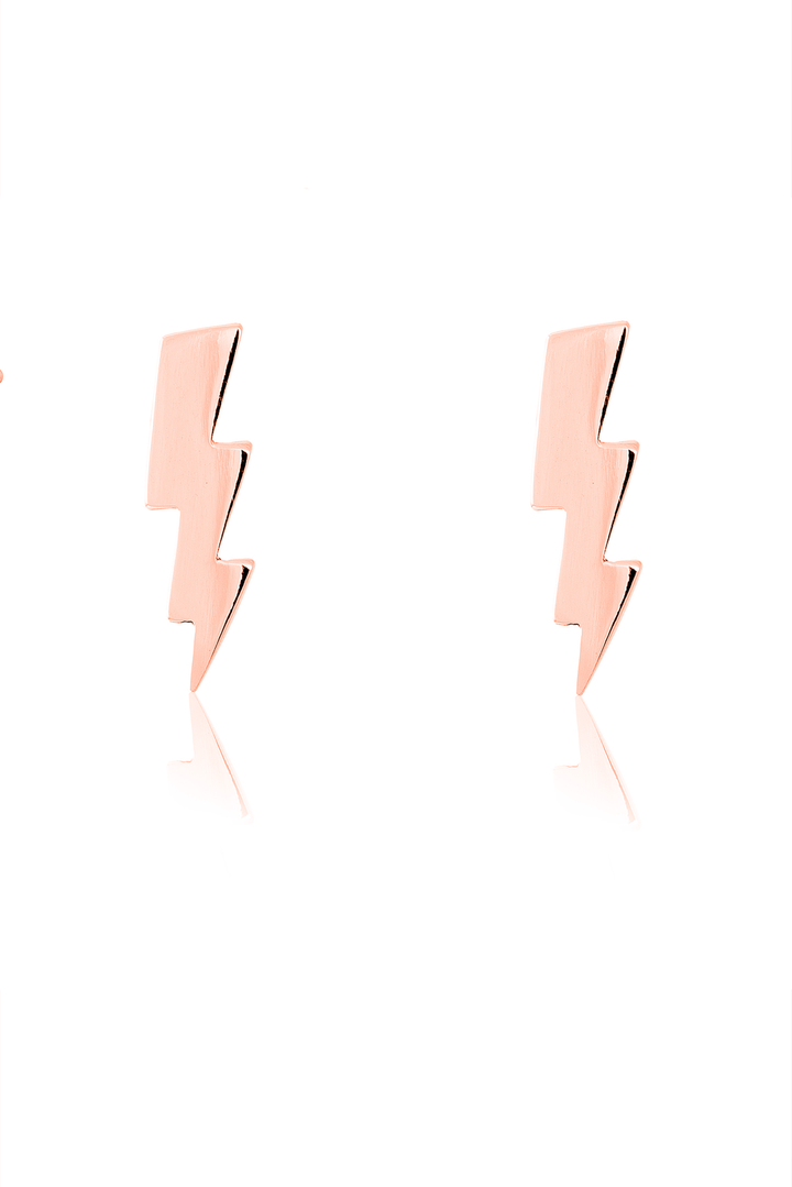 A pair of Large 9ct Gold Lightning Bolt Earrings by Cosmic Boulevard against a plain white background. The earrings are identical, featuring a sleek, geometric design resembling zigzag bolts of lightning.