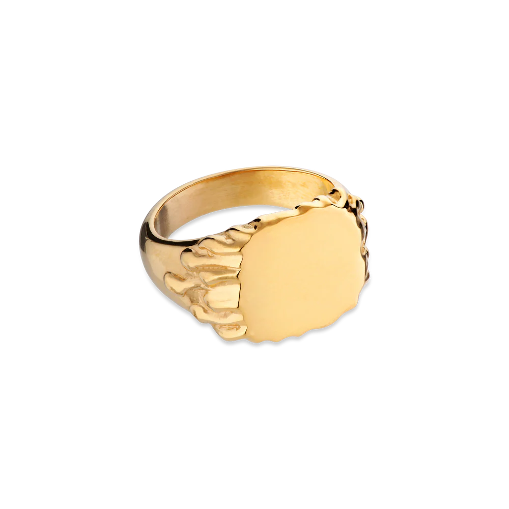 The Jane Koenig Drippy Signet Ring is gold plated with a smooth, round signet face and a sculpted skeleton hand on one side, shown on a plain white background.