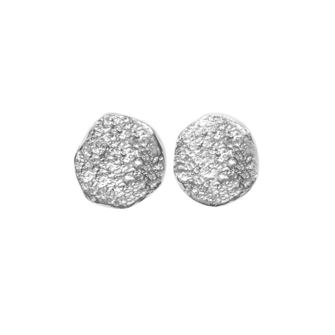The Dublin Bay Silver Studs by Ava Jane Jewellery are small, round sterling silver earrings with a textured hammered finish, shown on a plain white background.