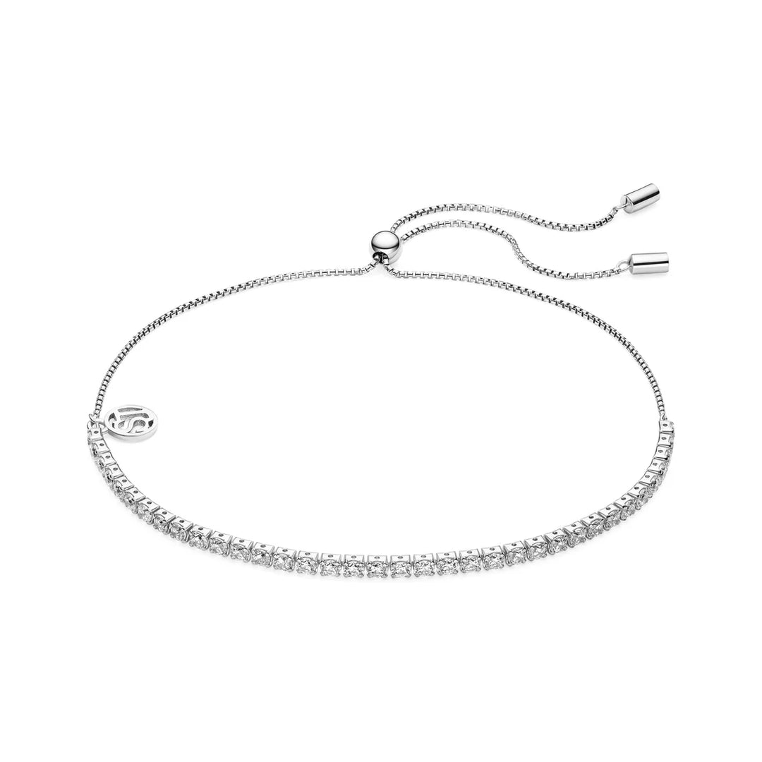 The Sif Jacobs Ellera Tennis Bracelet Silver is a delicate sterling silver piece with a row of sparkling clear stones, featuring an adjustable slider clasp and two small cylindrical ends.
