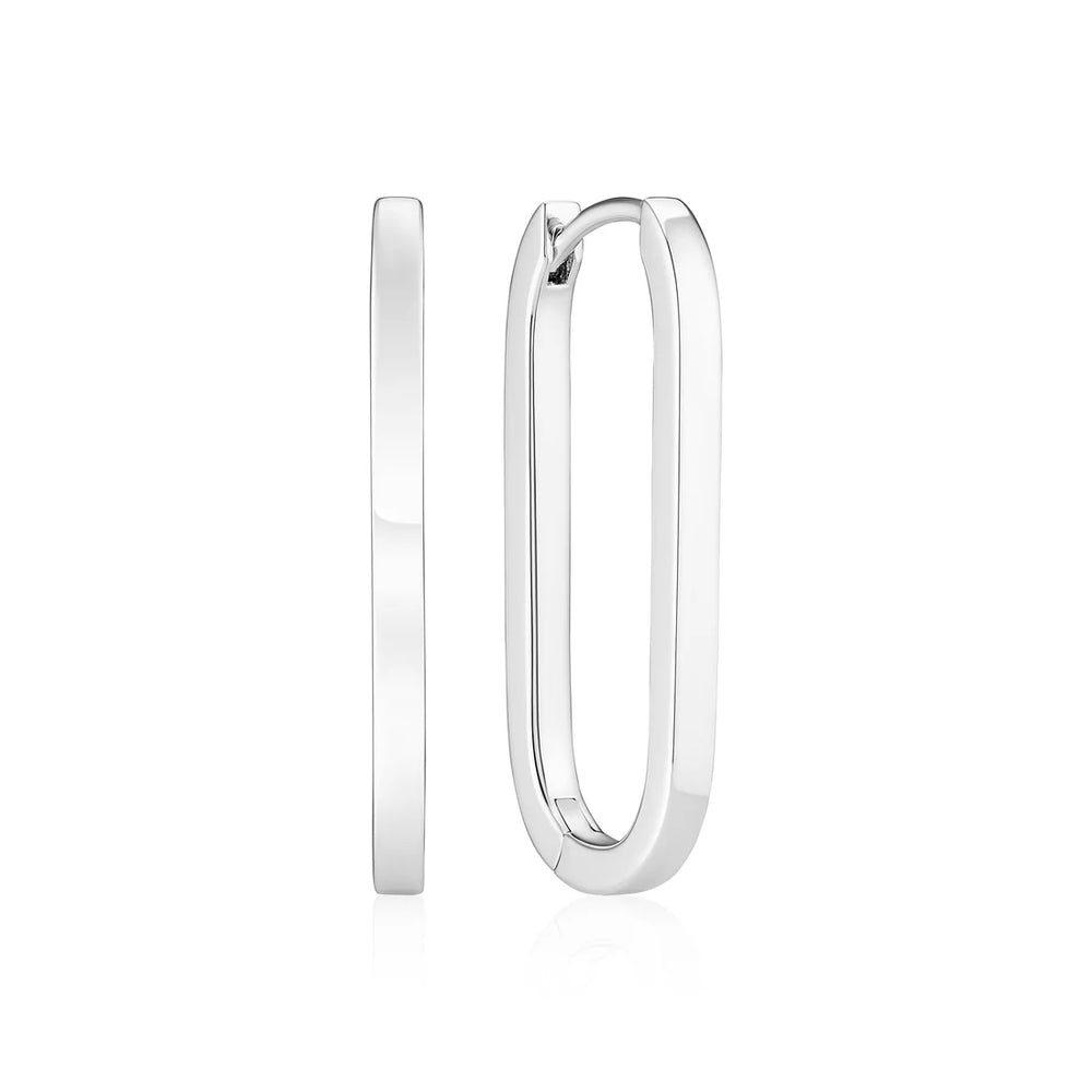 The Capizzi Pianura Medio Oval Hoop Earrings by Sif Jacobs are shown in side and front views against a white background, featuring a minimalist, polished sterling silver design ideal for demi-fine jewellery enthusiasts.
