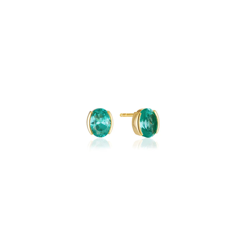 The Sif Jacobs Ellisse Carezza Stud Earrings are 18k gold plated with round, vibrant green gemstones, shown on a white background—a perfect piece of demi-fine jewellery.