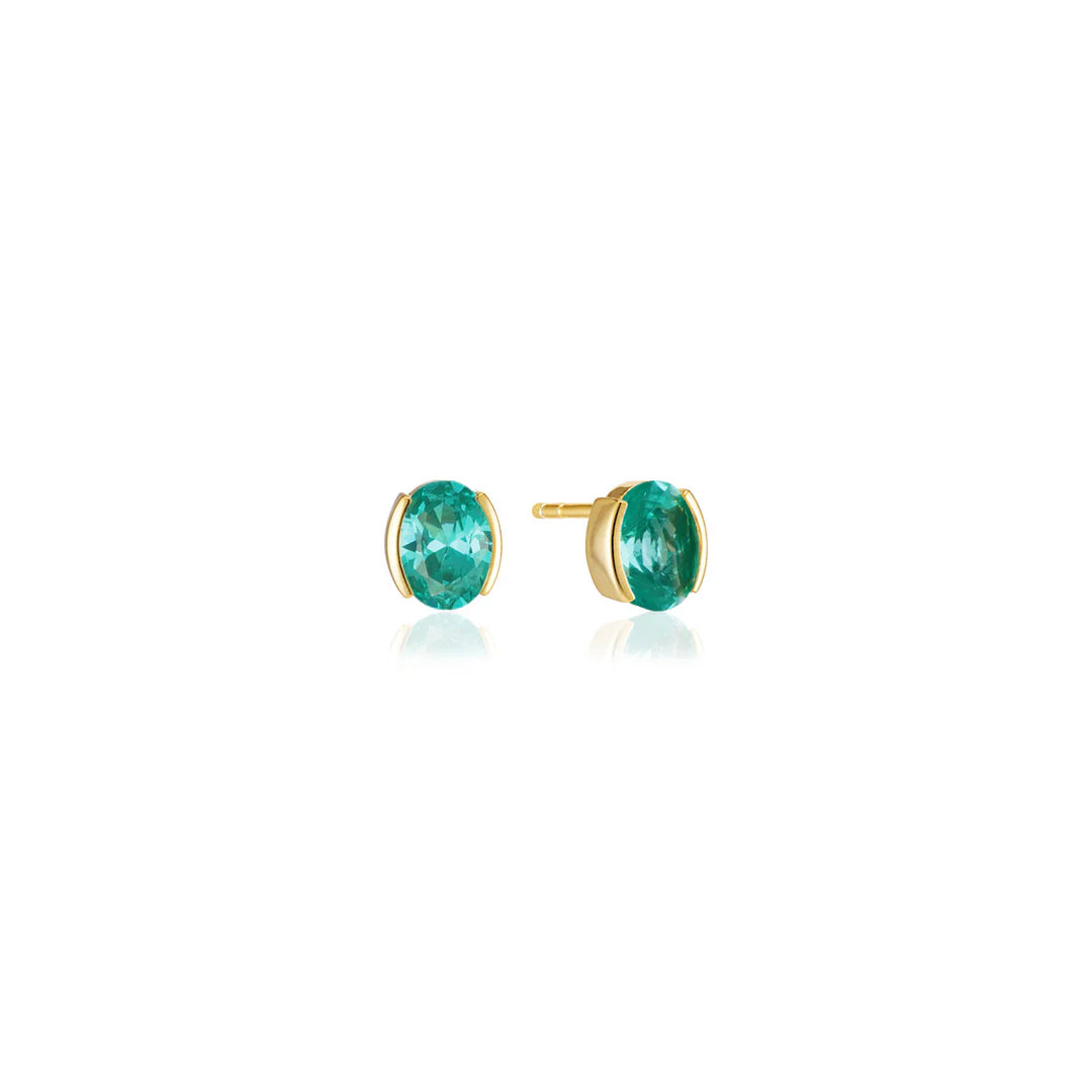 The Sif Jacobs Ellisse Carezza Stud Earrings are 18k gold plated with round, vibrant green gemstones, shown on a white background—a perfect piece of demi-fine jewellery.