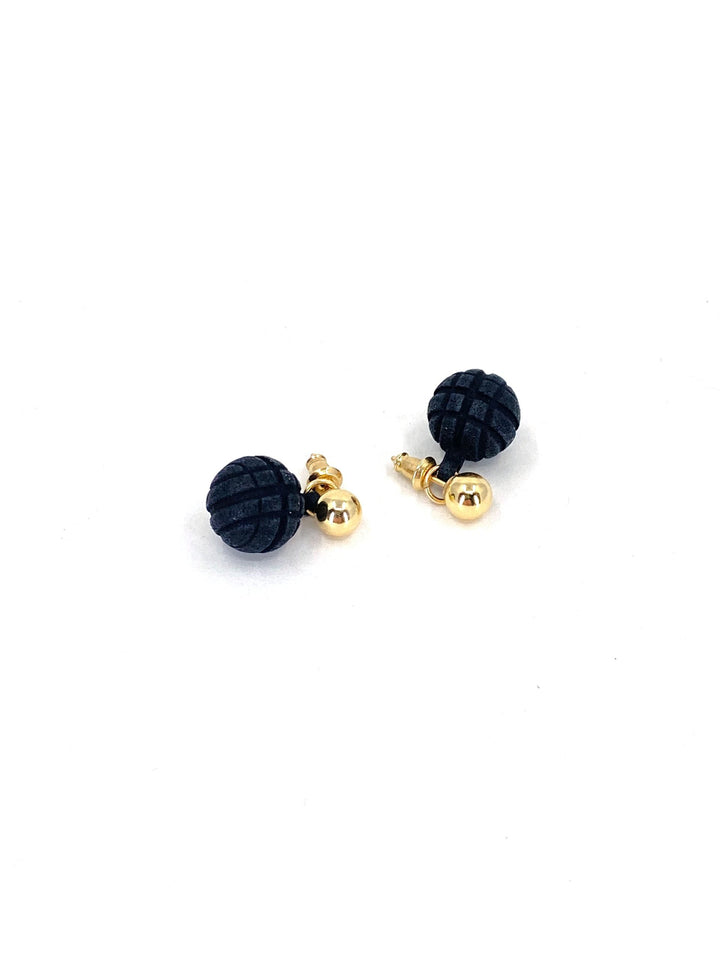 A pair of elegant "Vibe 2 Ball Stud Earrings" by Elsiem made of 14K gold filled metal with black, spherical, textured beads. The earrings have a classic gold post and butterfly clasp, resting on a plain white background.