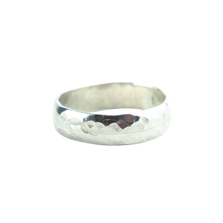 The Engravable Jewellery Engravable Simple Band Silver, featuring a hammered texture, is shown on a white background—a stylish ring ideal for custom engraving and meaningful personalization.