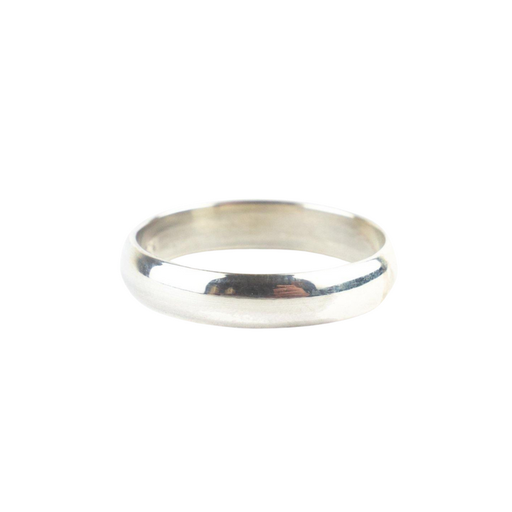 The Engravable Simple Band by Engravable Jewellery features a polished silver finish and a smooth, slightly rounded surface, displayed against a plain white background.