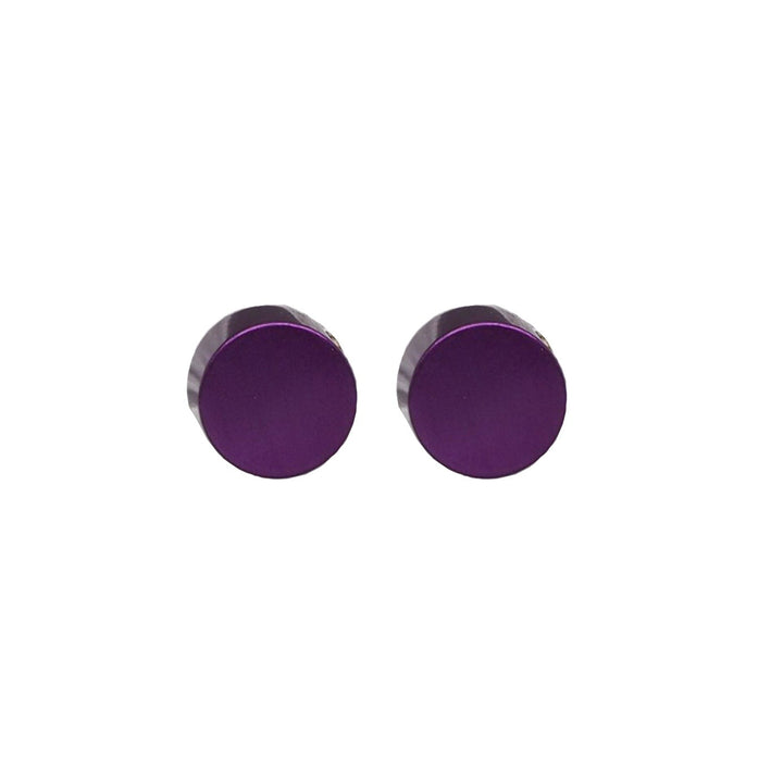 A pair of Cylinder Studs in a small, round shape, featuring a metallic purple color made of anodized aluminum by Filip Vanas, set against a white background.