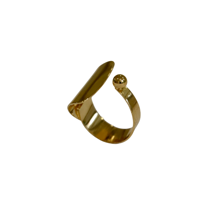 The Gold Plated Curve Ring by Zubeldia features a modern open band with a rounded ball end and a flat, slightly curved tip, inspired by Hélène Zubeldia, shown against a white background.