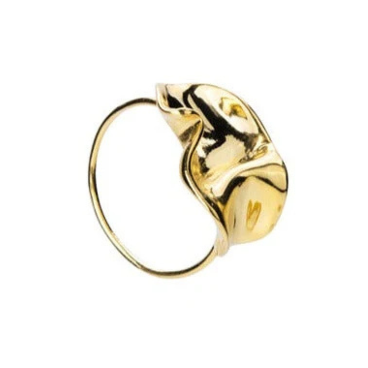 A close-up view of the Bonvo Flor Ring with a unique, abstract, and wavy design on top. The ring features a simple, thin band and an 18ct gold plating with a glossy, polished finish.