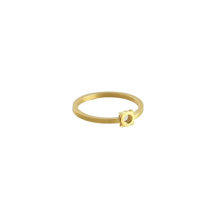 A minimalistic gold ring featuring a small, hexagon-shaped bezel with an empty center. The band is thin and smooth, creating an elegant and understated look. This 24ct gold-plated piece has a brushed finish, adding a modern touch to the classic Fruit Bijoux Minimal Ring Gold Plate design.