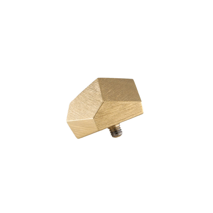 A Fruit Bijoux Ring Top Goldrush from Fruit Bijoux with a geometric design, featuring a screw for attachment at the bottom. Inspired by handmade jewellery, the knob boasts a modern, minimalist aesthetic with flat surfaces and clean lines.