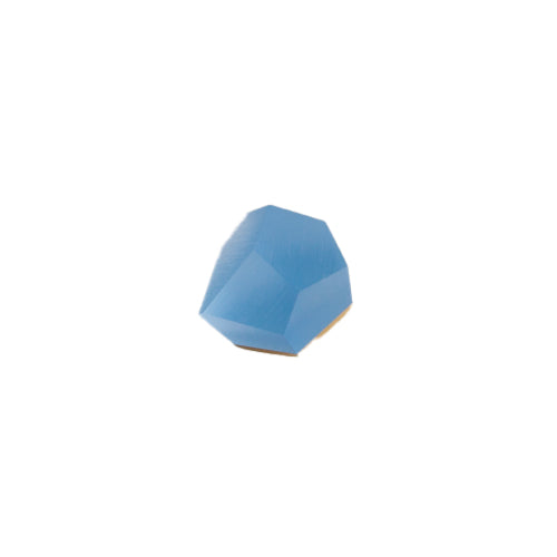 A single, faceted, irregularly-shaped blue gem or crystal with an angular, multi-faceted surface. This striking Fruit Bijoux Ring Top VU Crystals Sky Blue by Fruit Bijoux is set atop a sterling silver ring and is placed against a plain, white background.