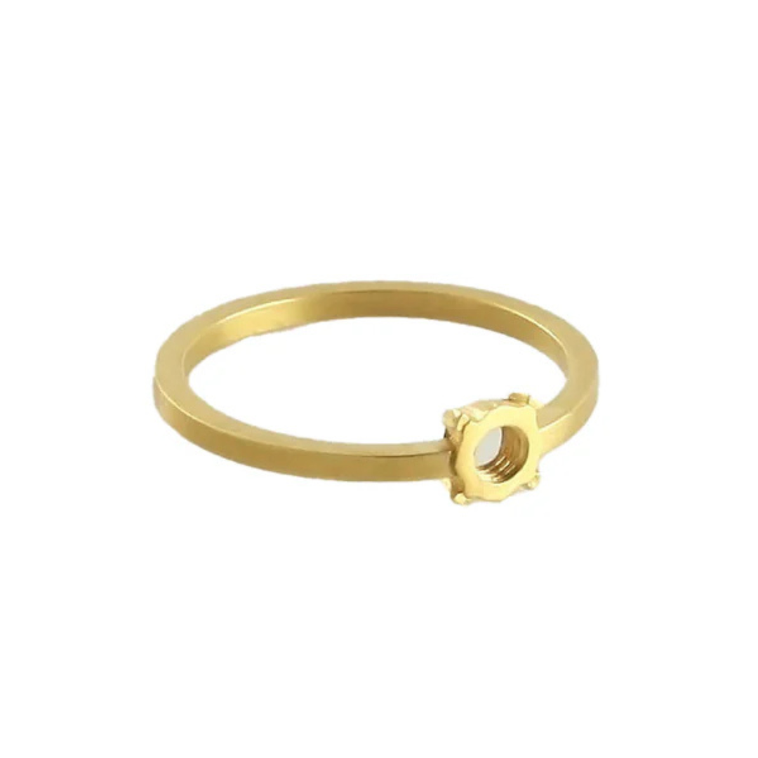 The Fruit Bijoux Minimal Ring Gold Plated Silver by Fruit Bijoux is displayed against a plain white background, showcasing its minimal design in gold-plated silver with a delicate, gear-shaped detail on top.