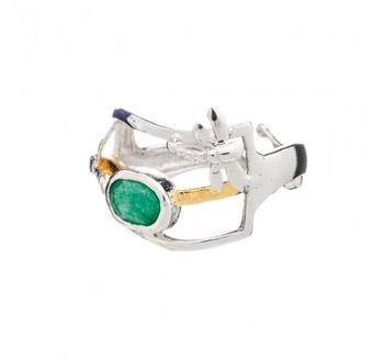 An intricate Small Dragonfly Ring in various gemstones by Gallardo & Blaine Designs featuring a prominent green gemstone in an oval shape. The band has unique, abstract details with additional small elements. This adjustable ring showcases a modern and artistic vibe.