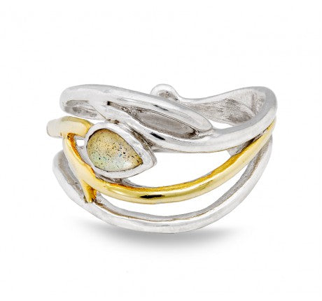 A Peacock Ring in various gemstones featuring a unique organic design with intertwining bands, one of which is gold-plated. The elegant dainty ring by Gallardo & Blaine Designs is accented with a pear-shaped, iridescent labradorite stone set in the center. Adjustable in silver & gold, the overall appearance is modern and stylish.